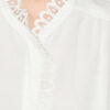 Estela-blus i enfärgad crepe med engelsk broderi Estela-blus i enfärgad crepe med engelsk broderi