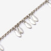 Metallarmband med glänsande blad och hängen