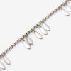 Metallarmband med glänsande blad och hängen